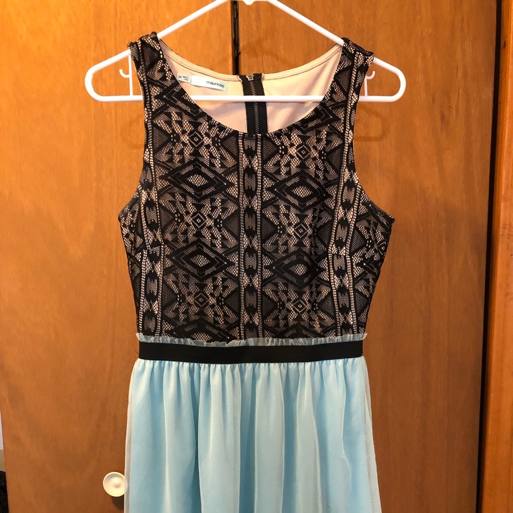 Maurice’s black lace and mint green dress.